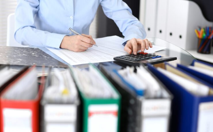 Bookkeeper Woman Or Financial Inspector  Making Report, Calculat